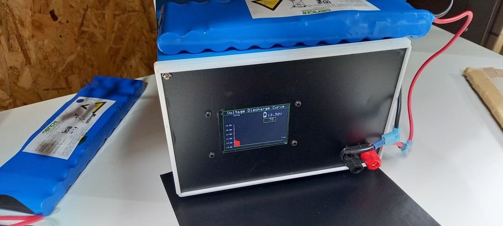 Custom-built lithium battery discharge tester plotting a voltage curve